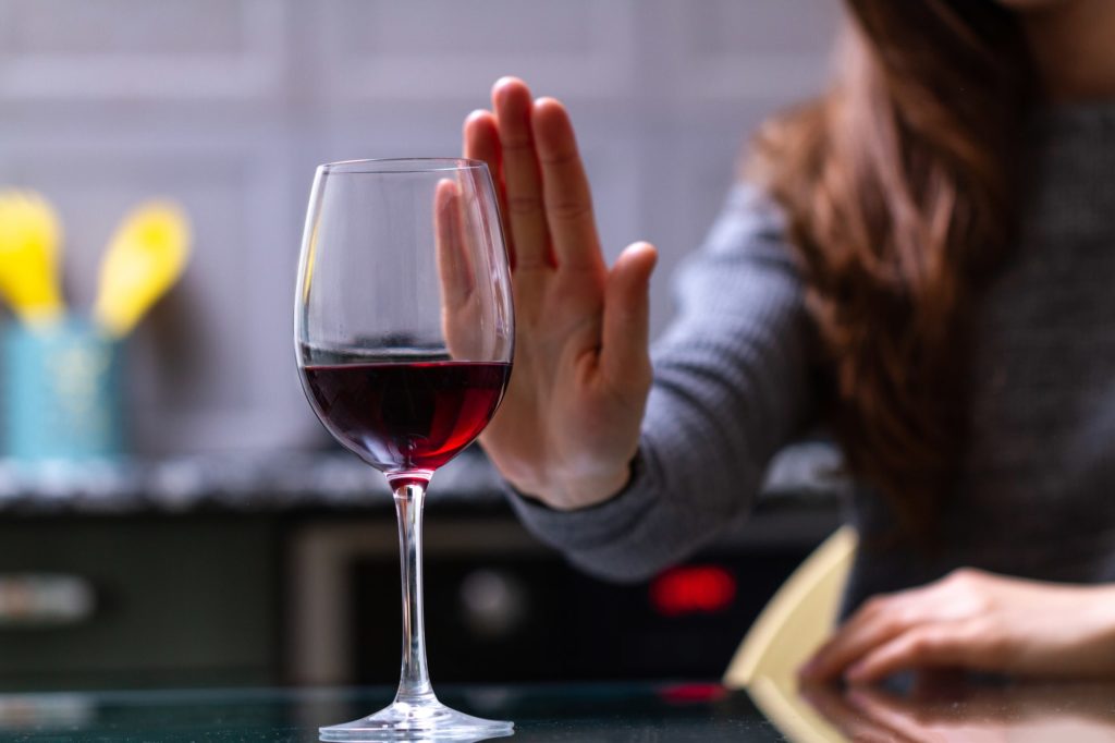 Woman is Refusing to Drinking Alcohol