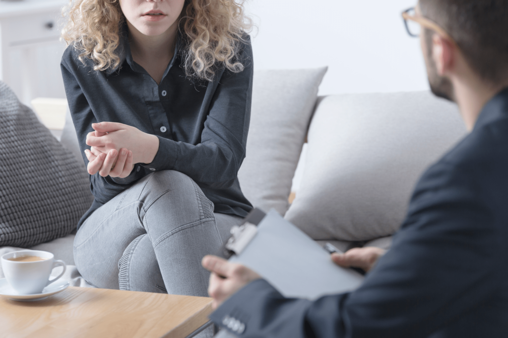 patient and mental health professional undergoing inpatient treatment