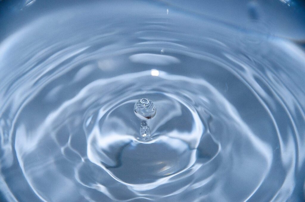 a water droplet falling into a bowl